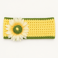 Handmade crocheted sunflower headband in yellow with olive green trim and a fabric daisy accent