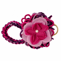 Magenta purple and lilac braided yarn wristlet keychain with layered pink flowers and pearl center